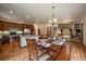 Open-concept living space with kitchen, dining area, and living room at 27756 Troublesome Gulch Rd, Evergreen, CO 80439