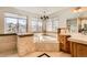 A luxurious bathroom featuring a soaking tub, natural light, and beautiful tile finishes at 7411 S Curtice Ct, Littleton, CO 80120