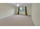 Spacious bedroom with large window offering natural light at 635 S Alton Way # 6A, Denver, CO 80247