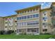 Spacious condo featuring screened in patios in a well-maintained community with lawncare included at 635 S Alton Way # 6A, Denver, CO 80247