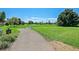 Manicured grounds with grassy fields and trees at 635 S Alton Way # 6A, Denver, CO 80247