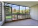 Enclosed patio with views of the green backyard at 635 S Alton Way # 6A, Denver, CO 80247