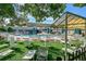 Enjoy a refreshing swim in the community pool surrounded by lounge chairs and lush landscaping at 635 S Alton Way # 6A, Denver, CO 80247
