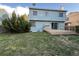 Backyard featuring a deck, lawn and the home's siding at 17969 E Brown Pl, Aurora, CO 80013