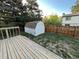 Backyard with a deck, lawn and a white storage shed at 17969 E Brown Pl, Aurora, CO 80013