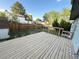 Backyard featuring wooden deck, lawn and wood fence at 17969 E Brown Pl, Aurora, CO 80013
