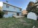 Exterior backyard view with a shed, deck and lawn at 17969 E Brown Pl, Aurora, CO 80013