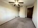 Bedroom features carpet, window and a ceiling fan at 17969 E Brown Pl, Aurora, CO 80013