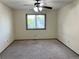 Standard bedroom with a ceiling fan and a window that offers natural lighting at 17969 E Brown Pl, Aurora, CO 80013