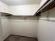 Inside the closet with built-in shelving for efficient storage at 17969 E Brown Pl, Aurora, CO 80013