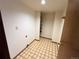 Efficient laundry room complete with shelving and ample space at 17969 E Brown Pl, Aurora, CO 80013