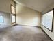 Spacious living room with vaulted ceilings, large windows and neutral walls offers a blank canvas at 17969 E Brown Pl, Aurora, CO 80013
