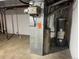 View of the home's utility room showcasing the HVAC system and water heater at 17969 E Brown Pl, Aurora, CO 80013