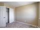 Spacious bedroom with neutral walls and carpet at 1179 S Waco St # E, Aurora, CO 80017