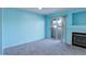 Living room with fireplace and sliding glass doors at 1179 S Waco St # E, Aurora, CO 80017