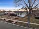 Nice home featuring a quaint yard, sidewalk, and minimalist landscaping, perfect for modern living at 2855 Albion St, Denver, CO 80207