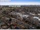 Aerial view of property and neighborhood including downtown Denver and City Park Golf Course at 2855 Albion St, Denver, CO 80207
