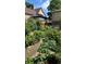 Lush backyard garden with rows of plants and vegetables at 2855 Albion St, Denver, CO 80207