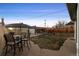 Large backyard with patio, seating, and a well-maintained lawn, perfect for outdoor living at 2855 Albion St, Denver, CO 80207