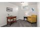 Cozy basement featuring stylish furniture, neutral carpet and decor, and recessed lighting at 2855 Albion St, Denver, CO 80207