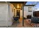 Inviting covered patio with comfortable seating, perfect for relaxing and entertaining outdoors at 2855 Albion St, Denver, CO 80207