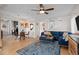 Inviting living room with stylish decor, hardwood floors, and ample seating, perfect for modern living at 2855 Albion St, Denver, CO 80207