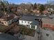 Aerial view of home with backyard, patio, garage, and landscaping at 2855 Albion St, Denver, CO 80207