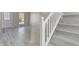 Entryway with modern floors, staircase, natural light, and freshly painted walls at 19828 E Brown Pl, Aurora, CO 80013