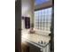 Relaxing bathroom featuring a jetted tub, privacy window, and modern fixtures for a spa-like experience at 1998 E 100Th Pl, Thornton, CO 80229