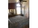The bedroom offers natural light, with storage and easy access to the bathroom, ensuring convenience at 1998 E 100Th Pl, Thornton, CO 80229
