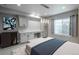 Bedroom with a desk, cabinets and a window with natural light at 23130 E Del Norte Cir, Aurora, CO 80016