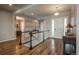 Welcoming foyer with staircase, hardwood floors, and a clear view to the main entrance at 23130 E Del Norte Cir, Aurora, CO 80016