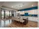 Modern kitchen featuring granite countertops, stainless steel appliances, and an island with seating at 23130 E Del Norte Cir, Aurora, CO 80016