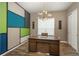 Stylish home office featuring a modern chandelier and custom wall design at 23130 E Del Norte Cir, Aurora, CO 80016