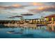 Enjoy the sparkling pool with lounge chairs and umbrellas, ideal for relaxation and soaking up the sun at 23130 E Del Norte Cir, Aurora, CO 80016