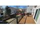 View from the back deck overlooking a fenced yard and neighboring houses at 2732 E 132Nd Pl, Thornton, CO 80241