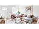 Inviting living room features chic furnishings, neutral color palette, and stylish decor for a cozy ambiance at 4025 E Martin Luther King Jr, Denver, CO 80207