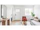 Bright living room boasts modern decor, stylish furniture, hardwood floors, and ample natural light at 4025 E Martin Luther King Jr, Denver, CO 80207