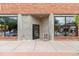Modern restaurant entrance featuring brick facade and large glass windows at 1551 S Grant St, Denver, CO 80210