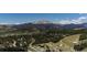 Aerial view features winding roads and breathtaking mountain range vista at 107 Ski Watch Rd # 32, Breckenridge, CO 80424