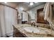 Elegant bathroom with granite countertops, a shower/tub combo, and stylish fixtures for a luxurious experience at 107 Ski Watch Rd # 32, Breckenridge, CO 80424