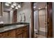 Well-appointed bathroom with a vanity, mirror, and a shower/tub combination for convenience and functionality at 107 Ski Watch Rd # 32, Breckenridge, CO 80424