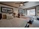 Inviting bedroom with twin beds, soft pillows, natural light, and a ceiling fan for a comfortable retreat at 107 Ski Watch Rd # 32, Breckenridge, CO 80424