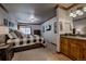 Well-lit bedroom with a comfortable bed, dresser, and bathroom access for convenience and functionality at 107 Ski Watch Rd # 32, Breckenridge, CO 80424