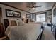 Bright bedroom with twin beds, plush pillows, a scenic window view, and a ceiling fan for relaxation at 107 Ski Watch Rd # 32, Breckenridge, CO 80424
