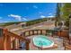 Hot tub with a scenic view of the ski slopes and beautiful mountain backdrop at 107 Ski Watch Rd # 32, Breckenridge, CO 80424