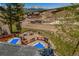 Scenic mountain resort view from a patio with picnic tables, hot tubs, and beautiful mountain views at 107 Ski Watch Rd # 32, Breckenridge, CO 80424