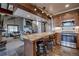 Open concept kitchen featuring a breakfast bar and an open layout to the living area at 107 Ski Watch Rd # 32, Breckenridge, CO 80424