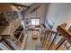 Unique living room with a stone fireplace, leather sofa, and mountain decor for an inviting atmosphere at 107 Ski Watch Rd # 32, Breckenridge, CO 80424