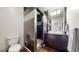 Contemporary bathroom features a tiled walk-in shower and modern vanity at 16491 Fairway Dr, Commerce City, CO 80022